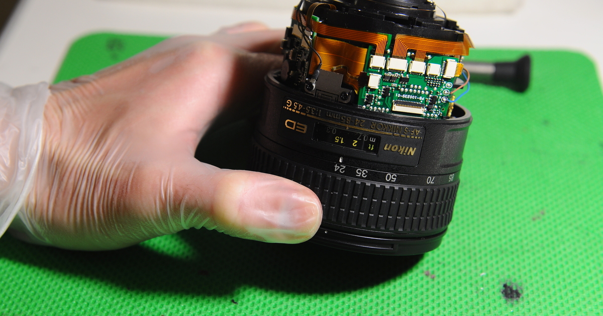 Ремонт Nikon. Мышка ремонт объектива.