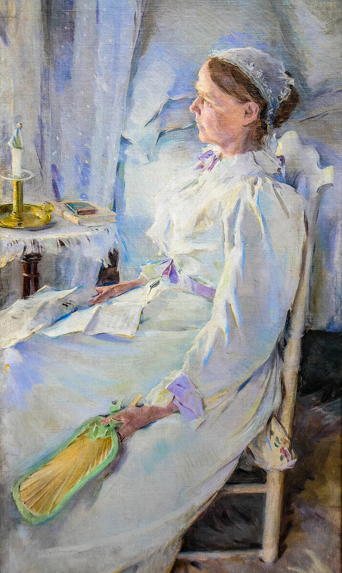 Девушка рисующая в саду