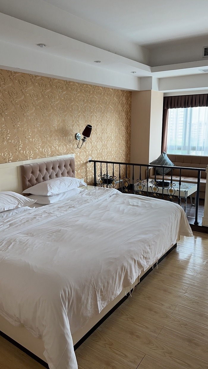 Номер за 212 юаней, который во время проведения выставки стоит 440RMB