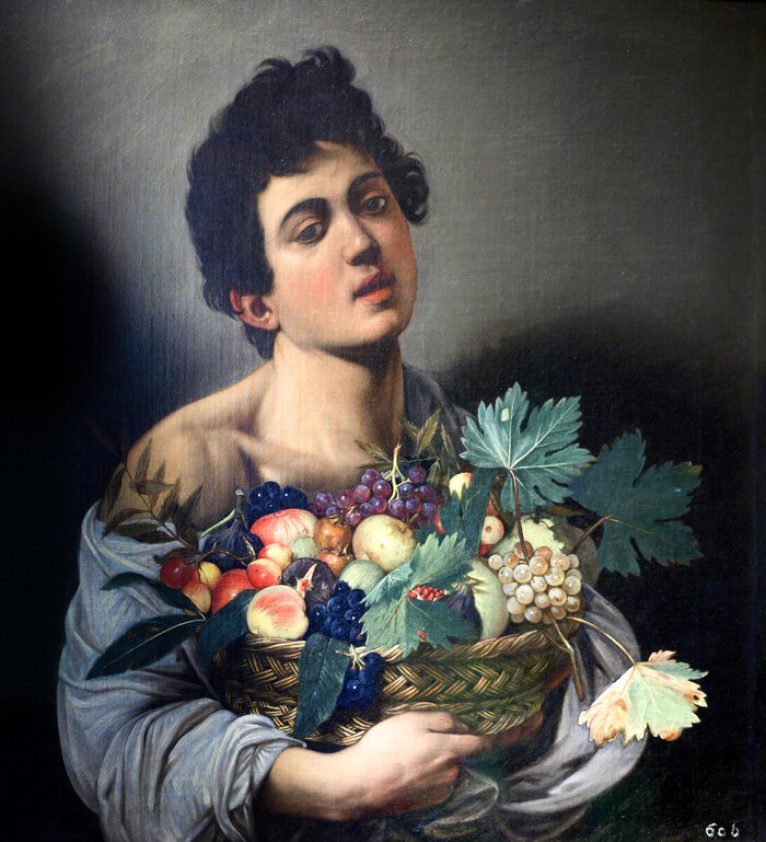 Юноша с корзиной фруктов. 1593–1594
